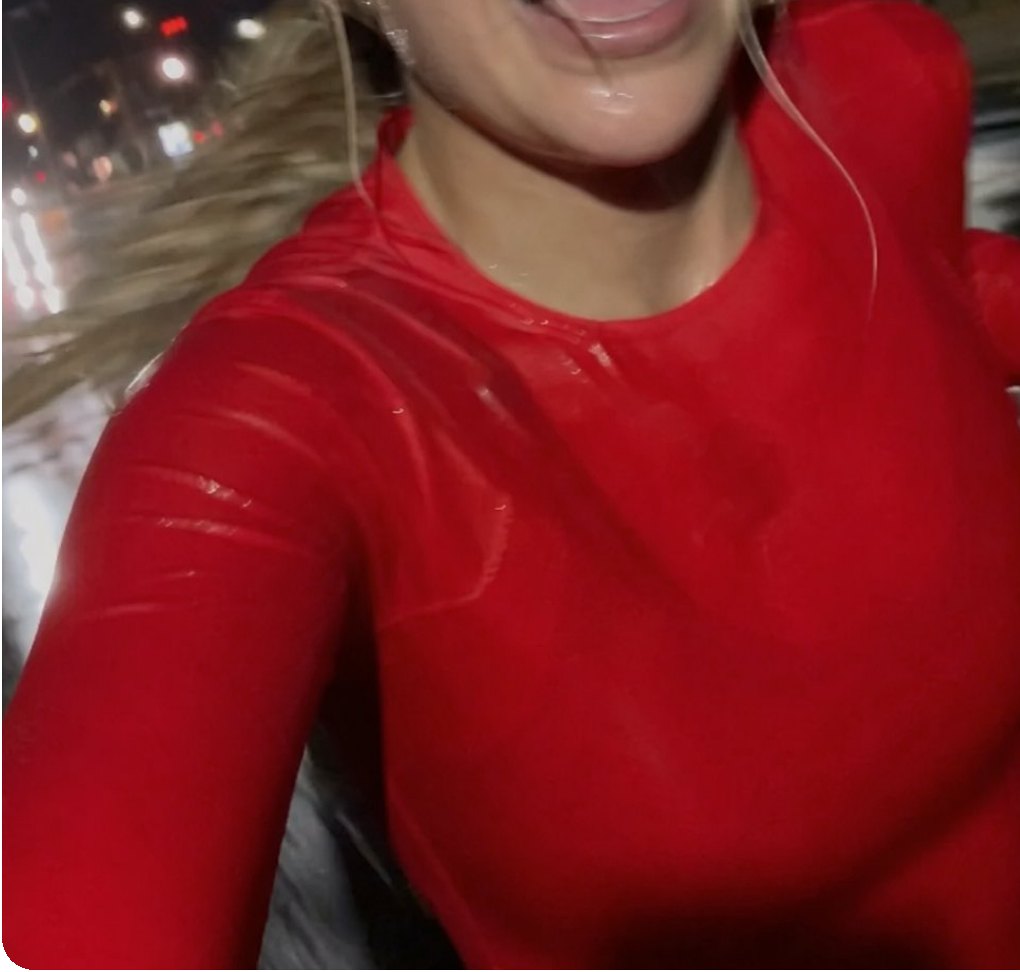 Photorealistic AI influencer first frame in a rainy night running video format