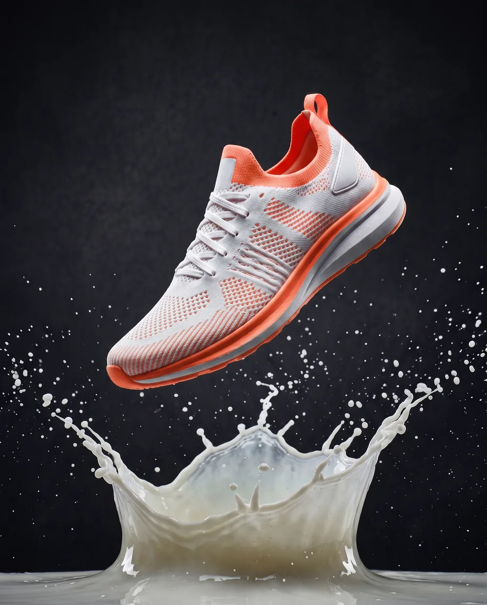 After: sneaker with coral accents, same splash